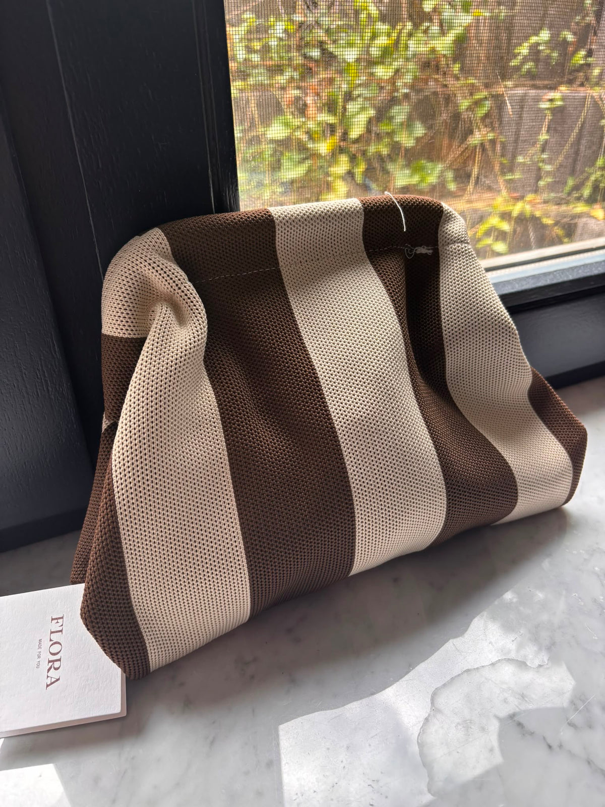 Gestreifte Strick-Clutch